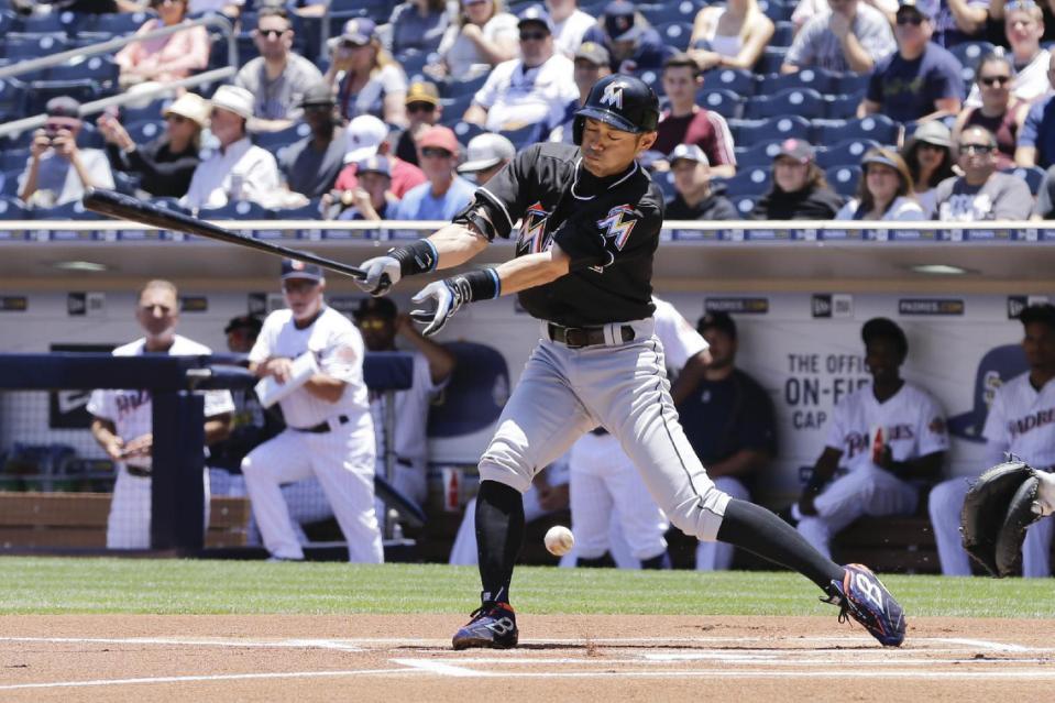Miami Marlins' Ichiro Suzuki hits a single during the first inning of a baseball game against the San Diego Padres Wednesday, June 15, 2016, in San Diego. Suzuki singled in the first inning to match Pete Rose's Major League hit record of 4,256. (AP Photo/Gregory Bull)