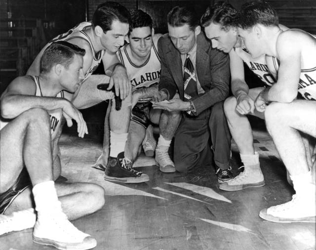 Hall-of-Fame head coach Bruce Drake with the starters on his 1946-47 squad that reached the NCAA title game (players from left are Dick Reich, Gerald Tucker, Jack Landon, Allie Paine and Paul Courty).